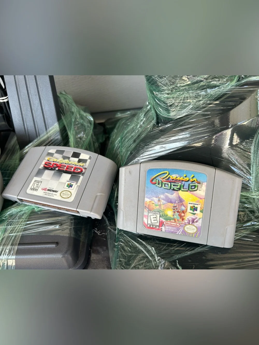 Nintendo N64 Console Bundle with Gray Controllers and Black Racing Wheel